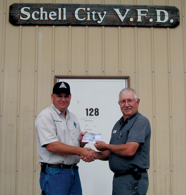 Schell City Fire receives check from MDC 2 cc